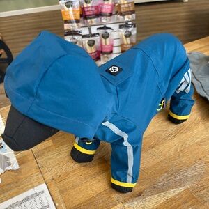 New never used doggie rain jacket onsie